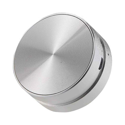 Silver portable speaker with white background 