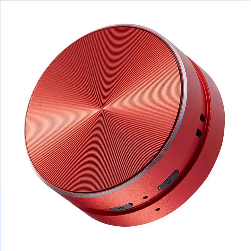 Red portable speaker on a white background