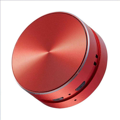 Red portable speaker on a white background
